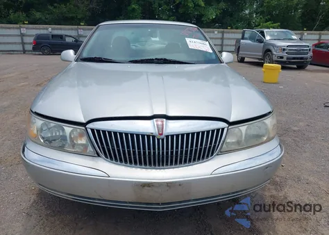 1999 Lincoln Continental z USA, uszkodzony, nr VIN 1LNHM97V7XY607937